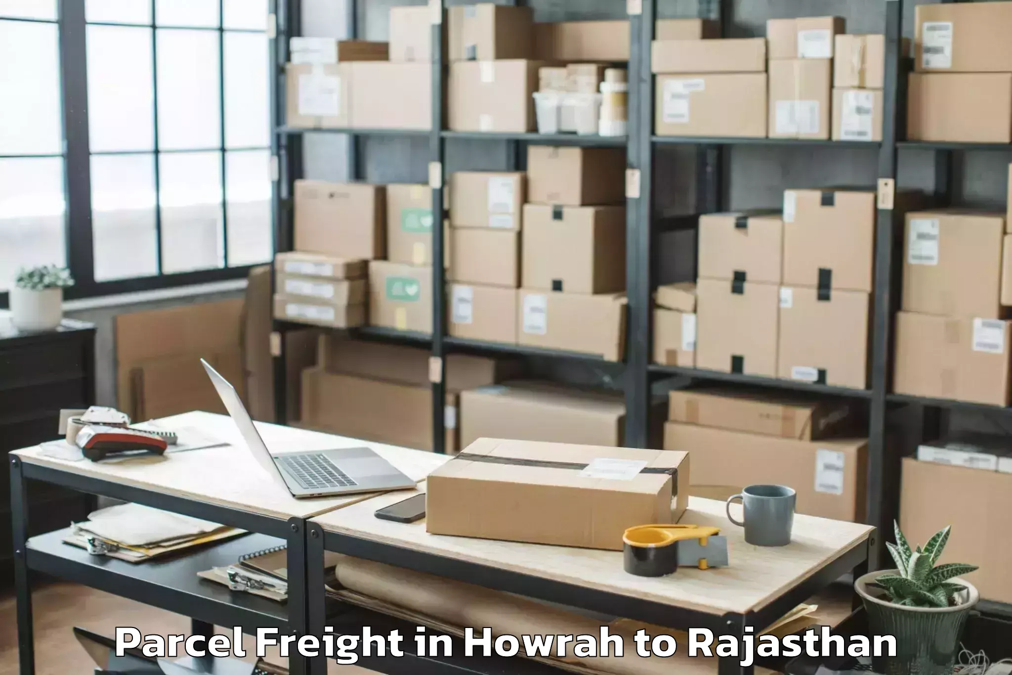 Easy Howrah to Kherwara Parcel Freight Booking